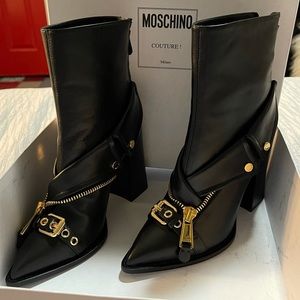 MOSCHINO *BRAND NEW*
NAPPA AND PONY SKIN BIKER ANKLE BOOTS
USD$1,340 Size 38 (8)